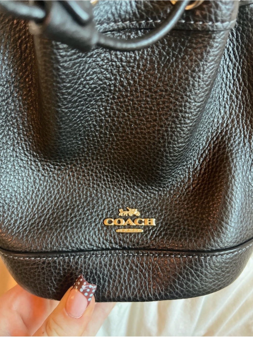 Black with gold accents Coach bag. - Picture 2 of 5